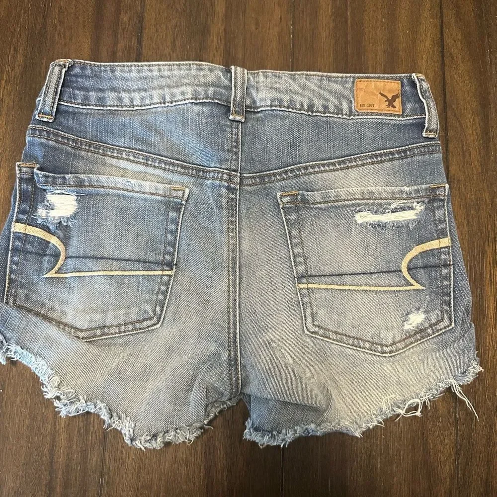 AMERICAN EAGLE Distressed Hi-Rise Festival Jean Shorts Size 0 Sequin Pockets